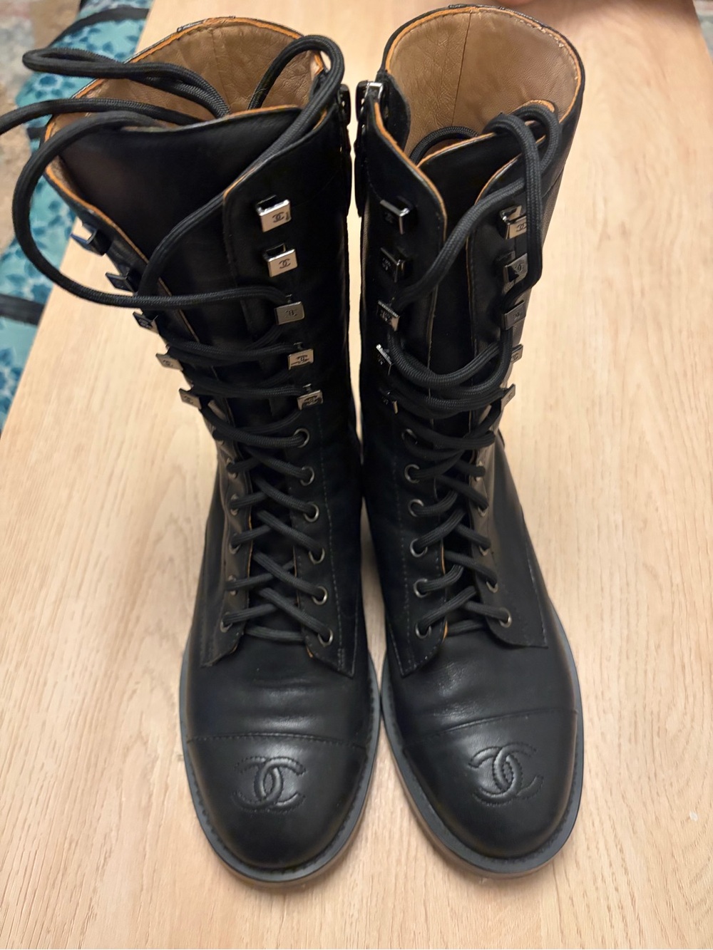 CHANEL Black Leather Lace-Up Combat Boots with Logo Cap